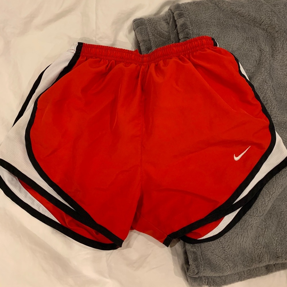 Red and white nike windbreaker shorts